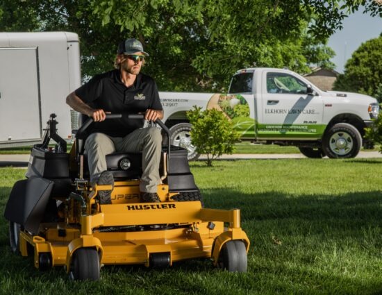 Elkhorn Lawn Care Staff Mowing in NE